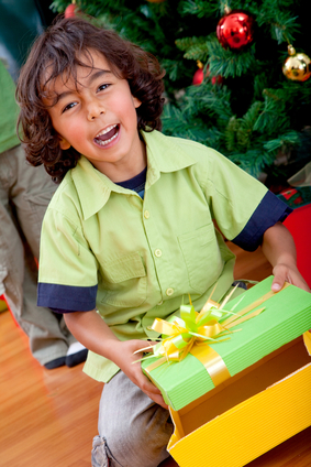kid opening a gift kid opening a gift